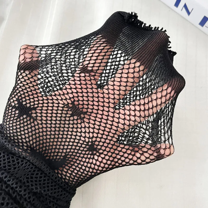 Medias con estampado de pentác - Bodystocking Fishnet reseña y precio